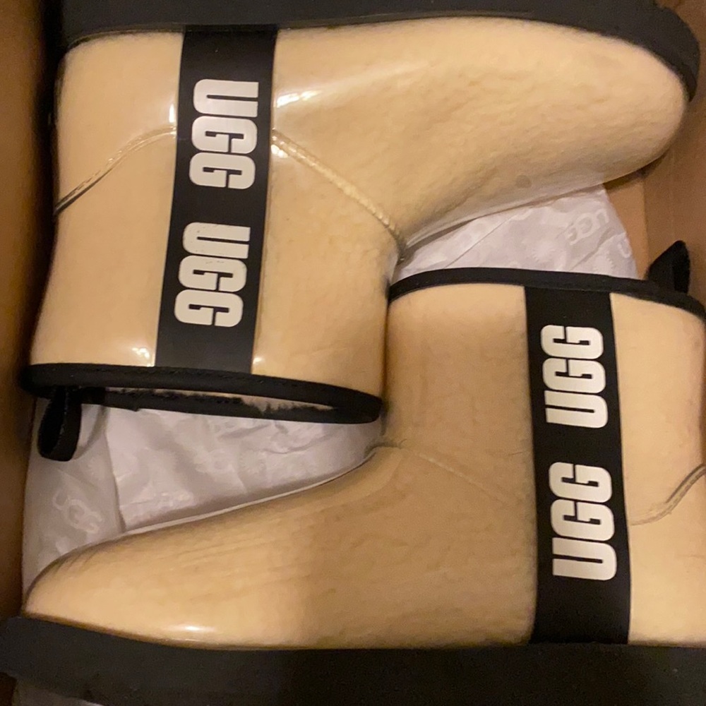 These are the clear cream, black & white UGG boots.